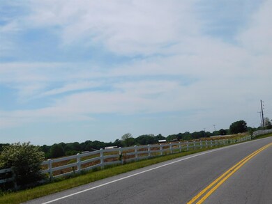LONG ROAD FRONTAGE APPROACHING PROPERTY FROM  THE INTERSTATE