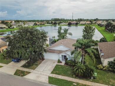 Overhead view of property and large pond