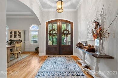 Gorgeous double door entry with trey ceiling.