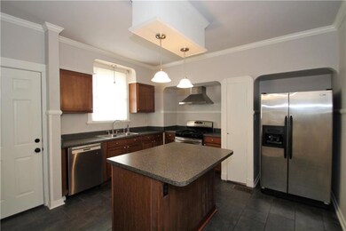 Renovated kitchen with new cabinets, stainless app