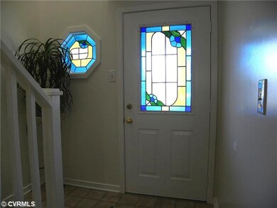 Foyer - Foyer with stained glass door and window