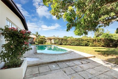 Pool with sitting area and ample back yard