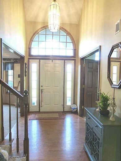Entry. Cathedral ceilings in dramatic entry way.