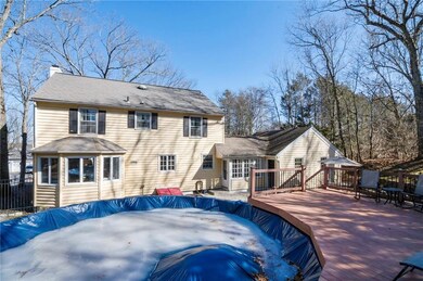 Exterior Back with Deck and Above-Ground Pool