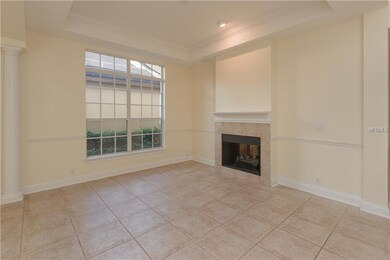 Dining Room features Trey Ceiling & Fireplace