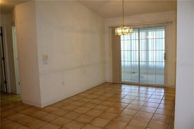 Dining room looking out to glassed in lanai