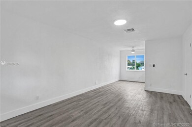 Living room and dining area.