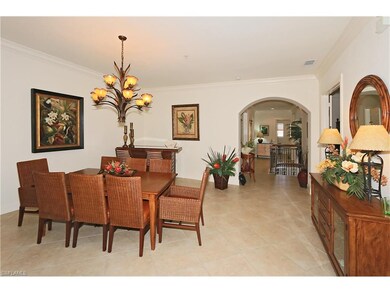 Dining Area with Tommy Bahama Glass Top Wooden Bar