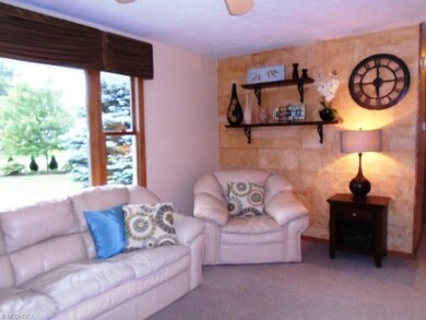 A huge picture window overlooks the beautiful fron