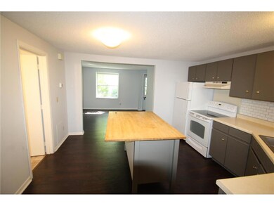 Additional view of the kitchen.
