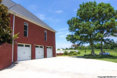 THREE CAR GARAGE ON LOWER LEVEL AT BASEMENT ENTRANCE.