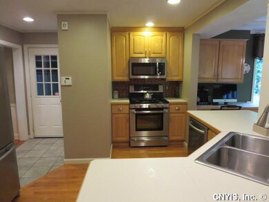 Kitchen. A side entrance joins the garage and the 