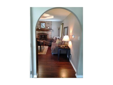 Just inside the front door.