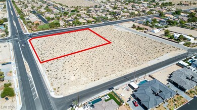 Aerial view of residential area with property parcel outlined