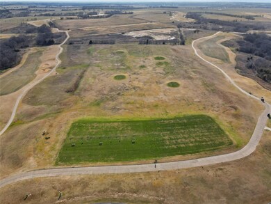 Birds eye view of property featuring a rural view