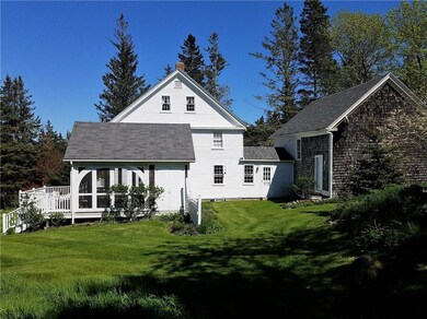 Attached barn separates house from...