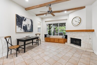 Breakfast room with picture views of vibrant backyard
