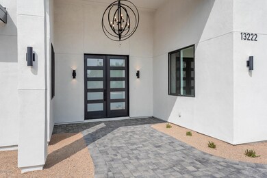 Double Door Entry w/ Huge Chandelier