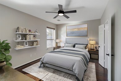 Come and unwind after a long day in this magnificent primary suite! This spacious room features high ceilings, beautiful custom ceiling fan, custom paint and a large window with privacy blinds.
