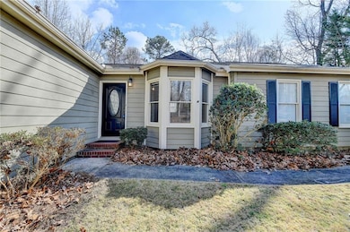 Entrance to property with a yard