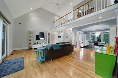 Great rm has Vaulted ceilings, wood flrs. & fan.