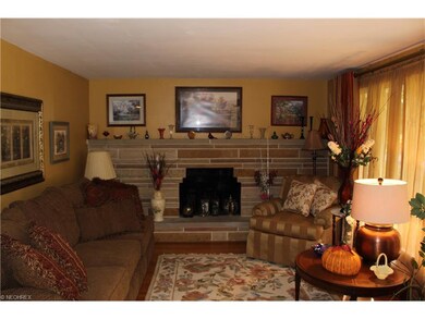 Oak flooring with two sandstone fireplaces.