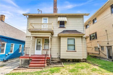 View of front of house with a balcony