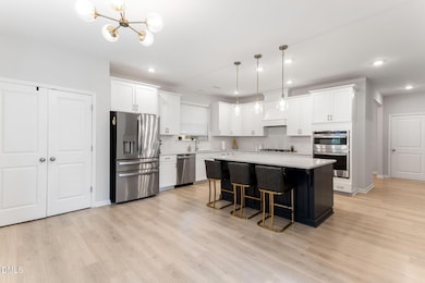 2137 Curry Meadow Way, Durham, NC 27703 - photo 6