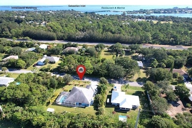 9590 Honeysuckle Dr, Sebastian, FL 32976 - photo 2