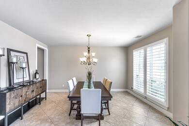 Formal dining room with tile flooring
