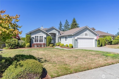 Mature well cared for landscaping both front and back.