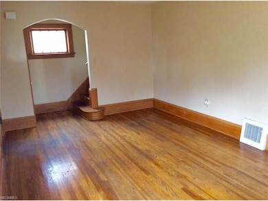 View from living room to the second floor stairs.