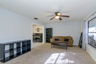 The spacious living room lead into the dining room