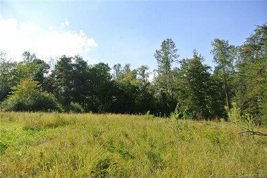 BACK OF APPROXIMATELY 1 ACRE IN PASTURE