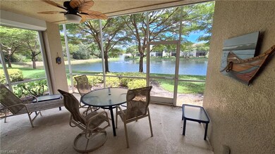 Sunroom with a water view, ceiling fan, and plenty of natural light