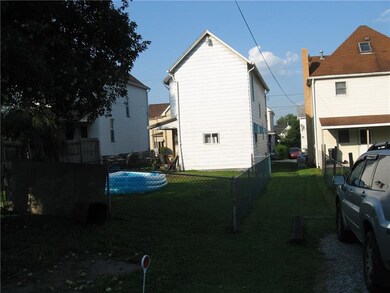 Rear of 39 Second Avenue from alley. Off street pa