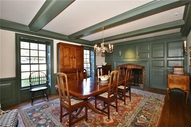 The dining room features beamed ceiling and large 