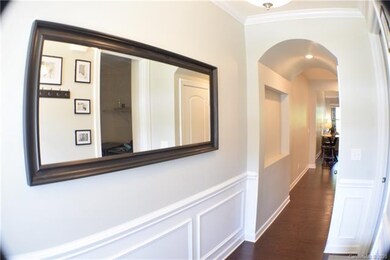 Walk on your hardwood floors as you enter into the foyer.