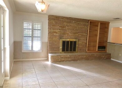 Great Room with Fireplace, Built-Ins & Plantation 
