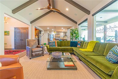 Family room leading to dining and kitchen- open fl