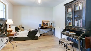 Den/living space located off foyer and across from Dining Room