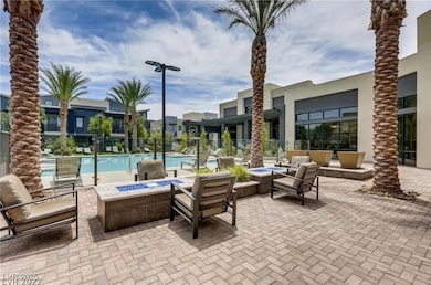 View of patio / terrace featuring a community pool