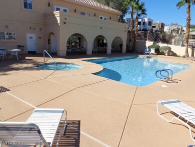 Community pool with a patio area