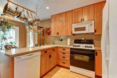 Kitchen & dining area overlook beautiful patio are