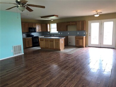 open living, kitchen, and dining area