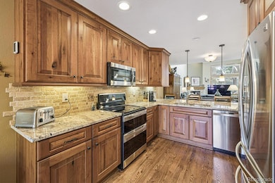 Granite Countertops & Travertine Back Splash