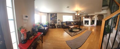 Living room featuring ornamental molding, ceiling