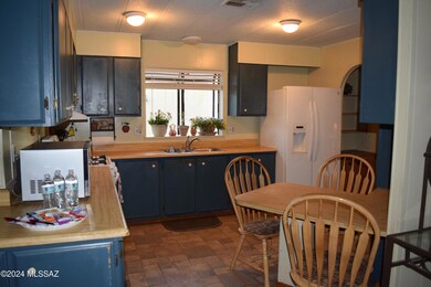 Kitchen has lots of cabinets