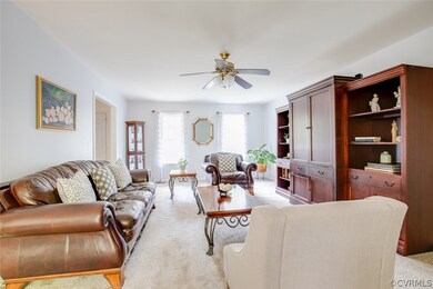 Family room with tons of natural light.  Pure eleg