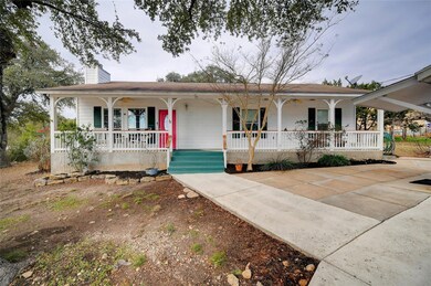 Single story home featuring covered porch and a c